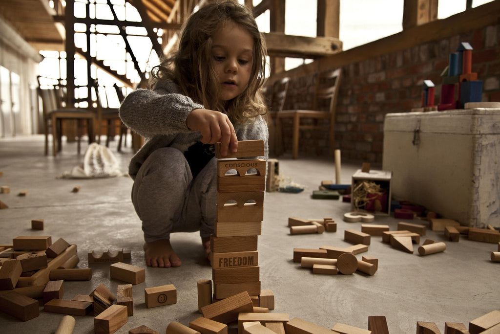 Natural wooden blocks arranged for play