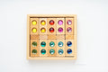 Bauspiel Colour Street with View Blocks arranged in the wooden tray.