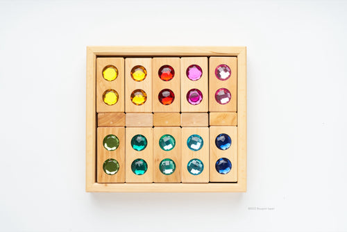 Bauspiel Colour Street with View Blocks arranged in the wooden tray.