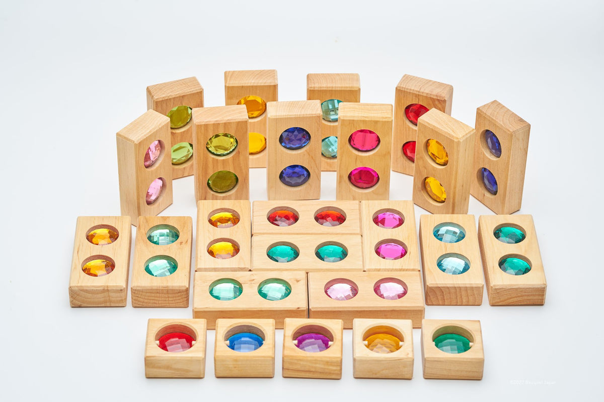 Bauspiel Colour Street rectangular blocks and five View Blocks arranged to show their coloured inserts.
