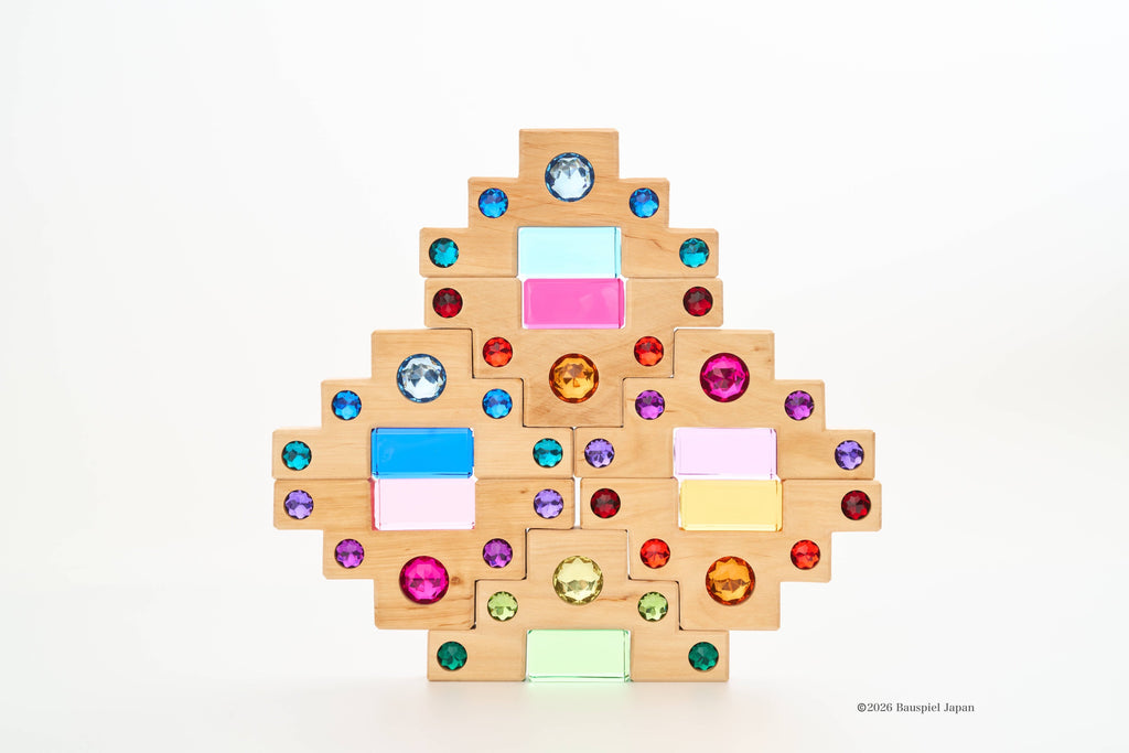 Bauspiel Small Colour Staircase & Light Blocks combined into a colourful geometric pattern.