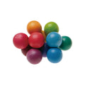 GRIMM’S Rainbow Bead Grasper, with colourful connected wooden beads gathered into a rounded shape.